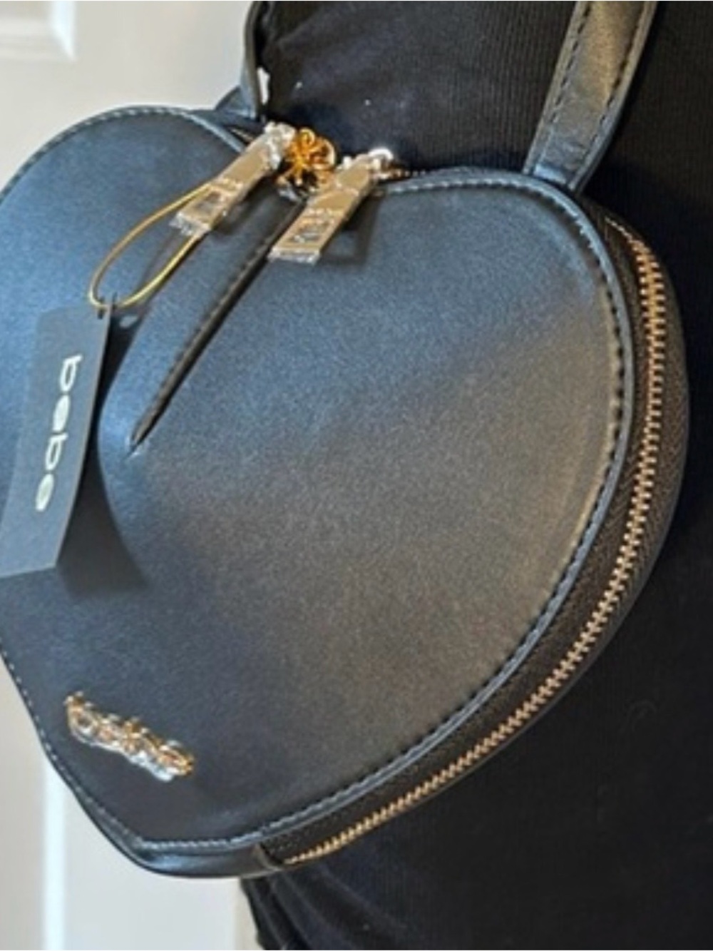 bebe Black Heart-Shaped Crossbody with Gold Accents